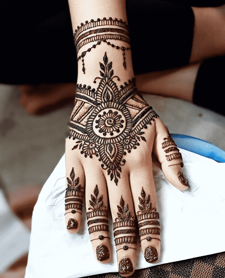 Mesmeric Back Hand Henna Design