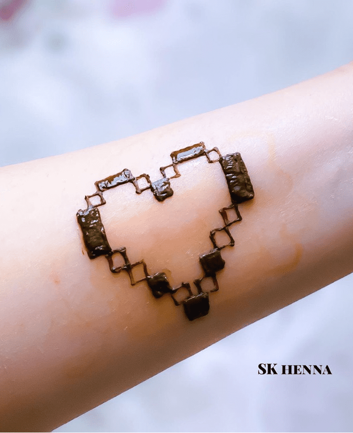 Admirable Heart Henna Design on wrist