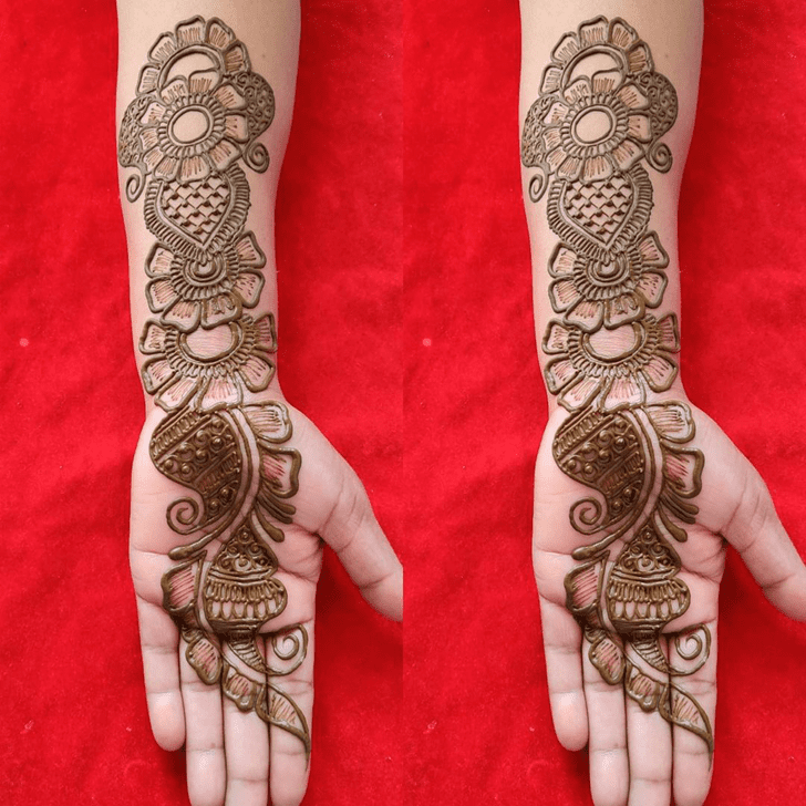 Divine heart Henna on Back Hand
