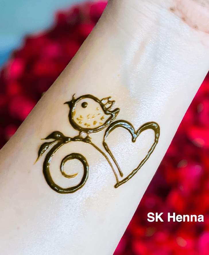 Pretty Heart Henna Design on hand