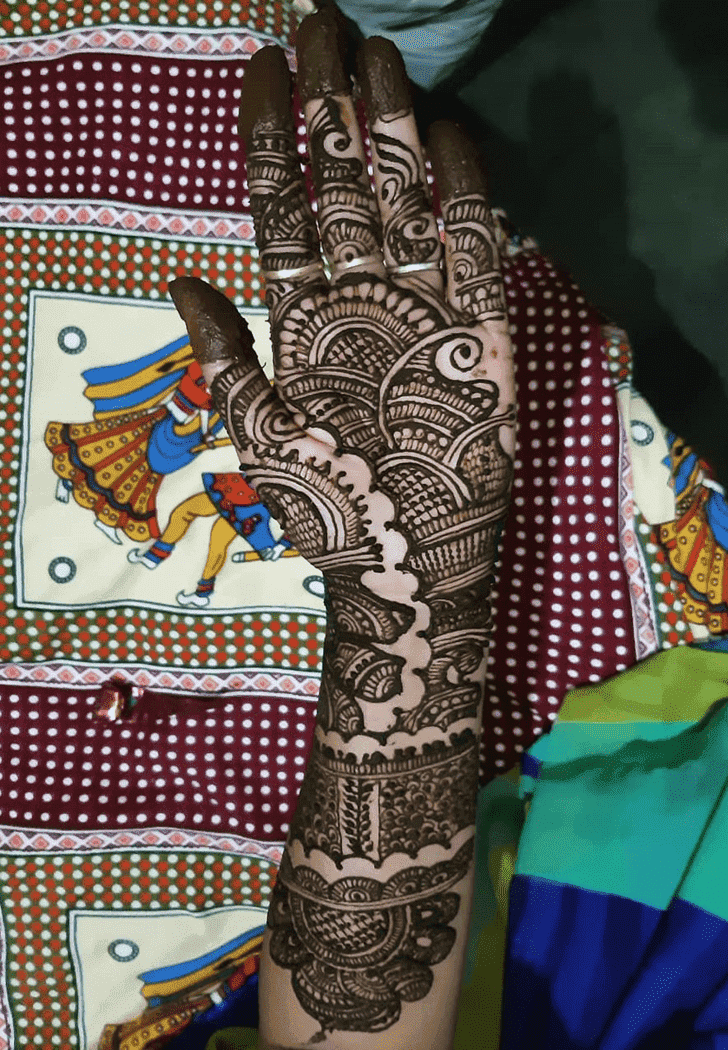 Alluring Raksha Bandhan Henna Design on Back hand