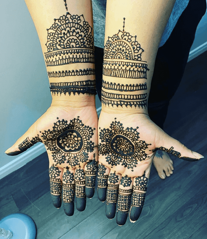Appealing Raksha Bandhan Henna Design on Back Hand