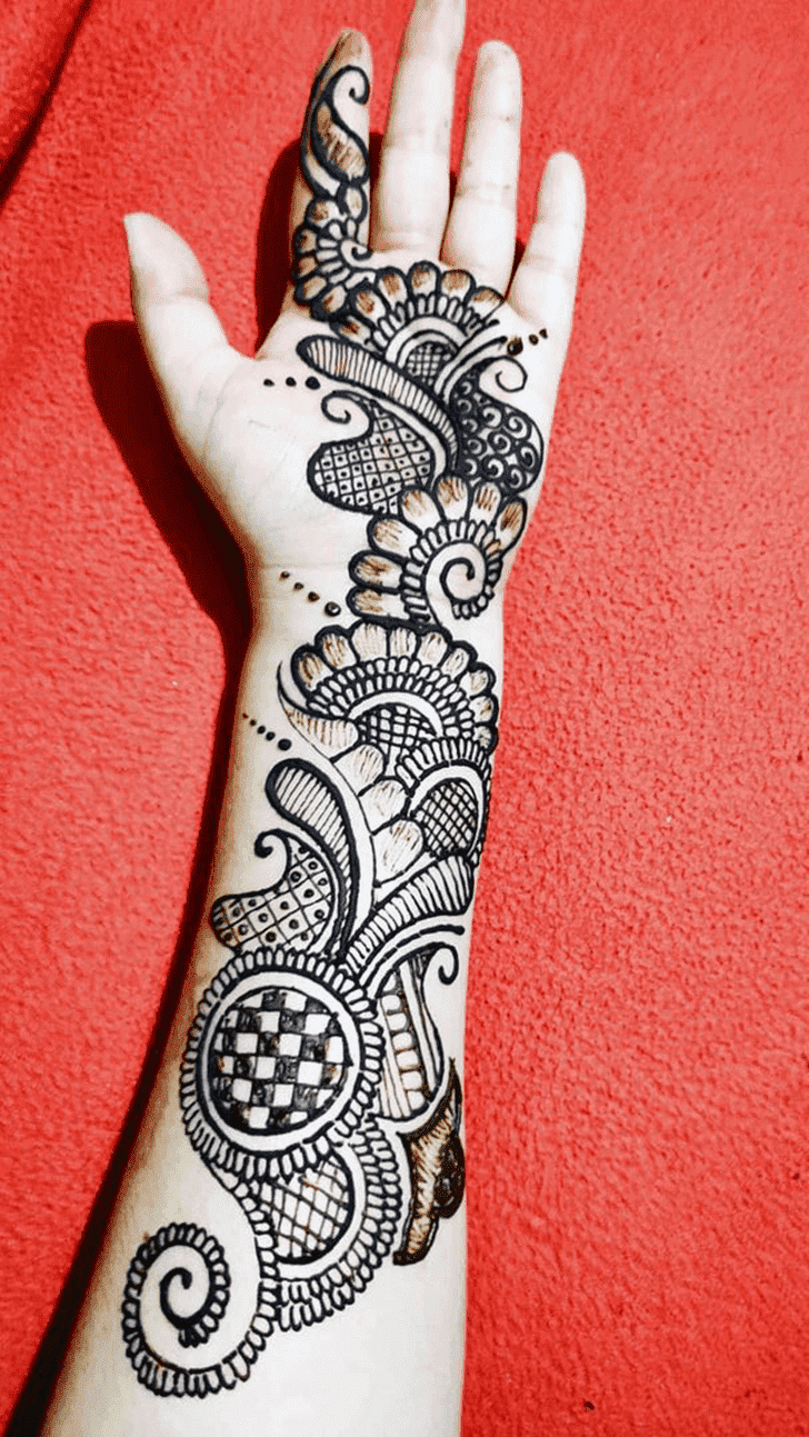 Cute Raksha Bandhan Henna Design on Back Hand