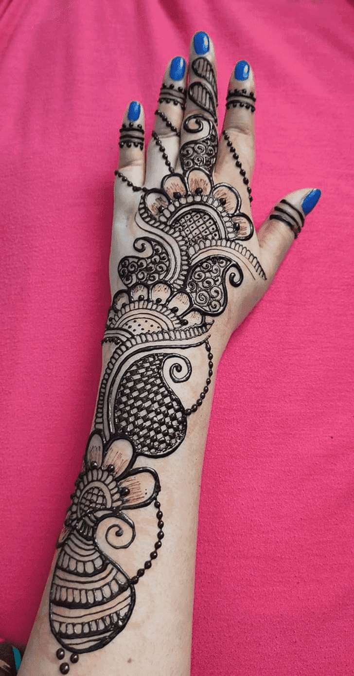 Delicate Raksha Bandhan Henna Design on Back Hand