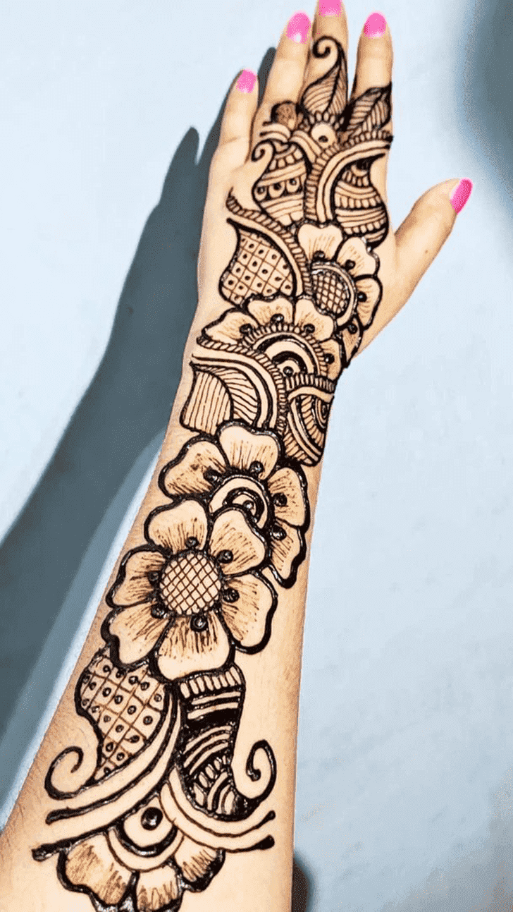 Divine Raksha Bandhan Henna Design on Back Hand