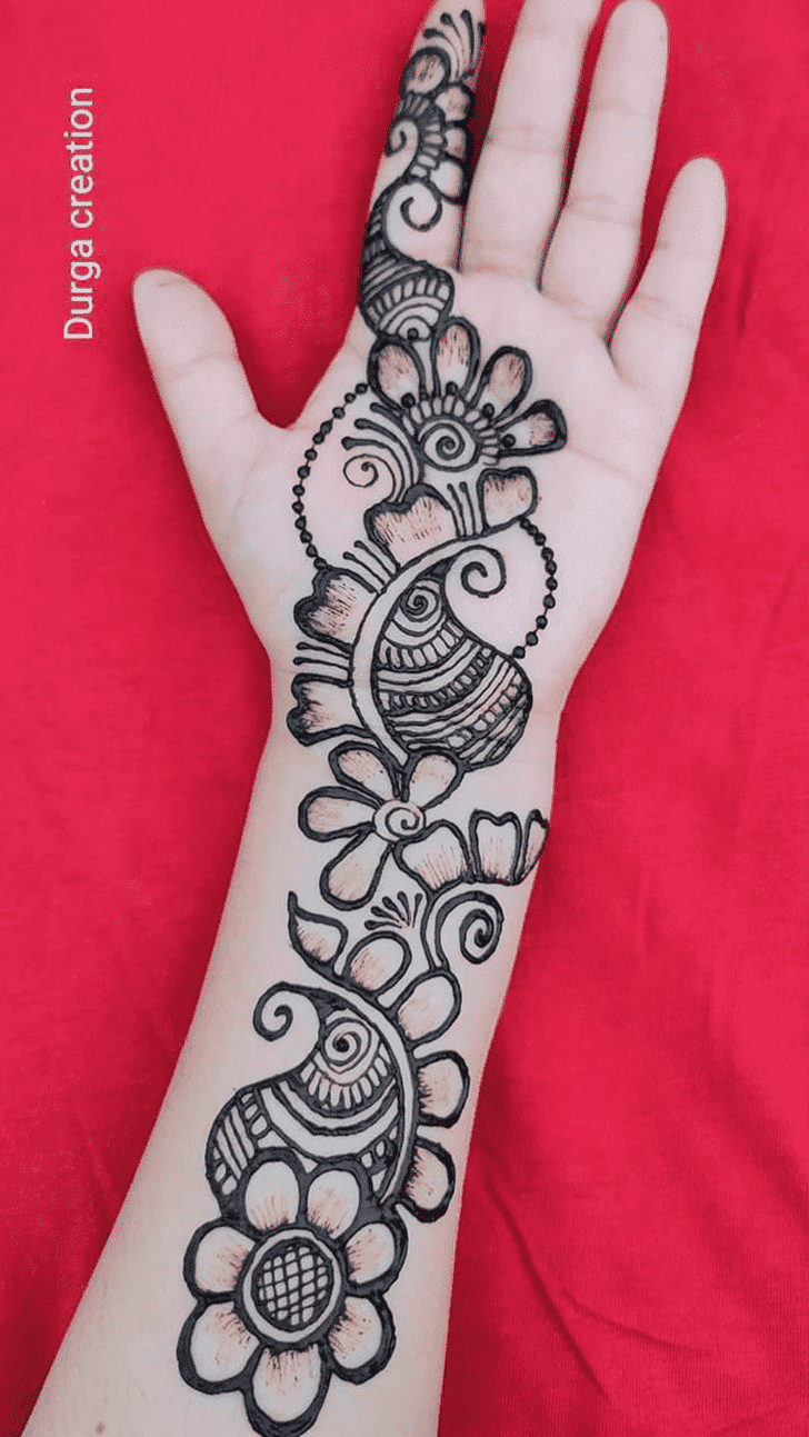 Elegant Raksha Bandhan Henna Design on Back Hand