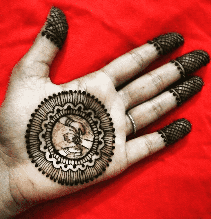 Graceful Raksha Bandhan Henna Design on Back Hand