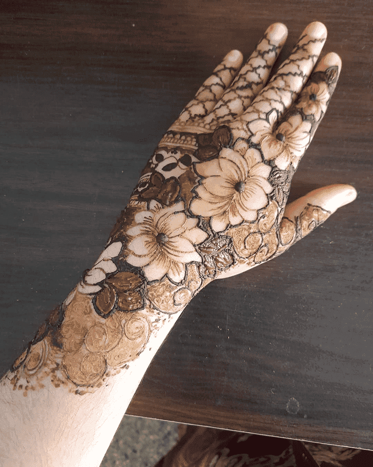 Pleasing Raksha Bandhan Henna Design on Back Hand