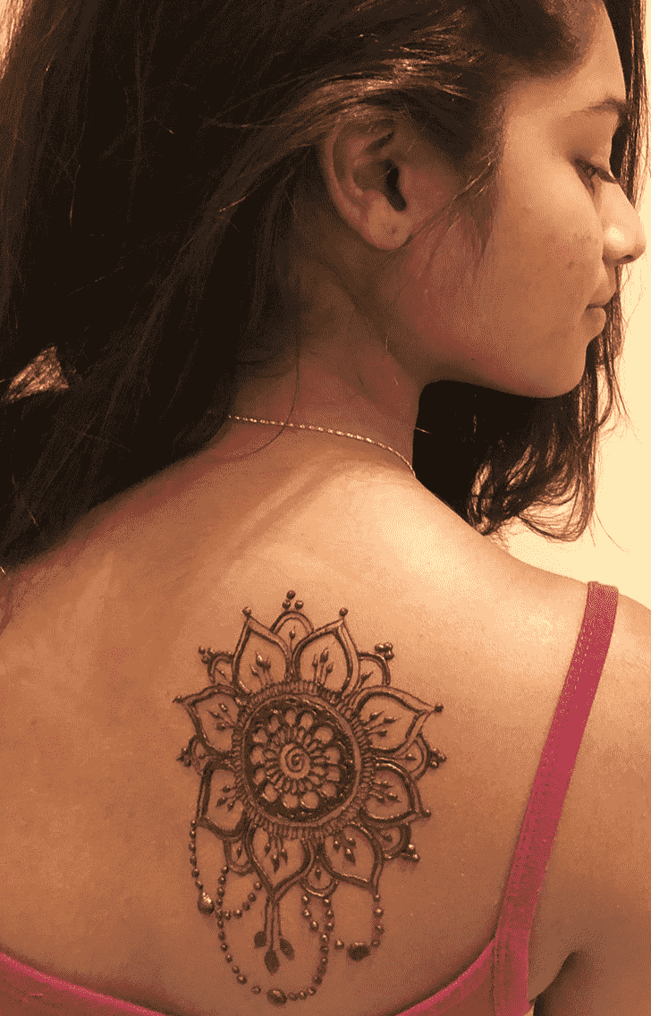Closeup henna tattoo on womans shoulder Closeup freshly done henna tattoo  on womans shoulder  CanStock