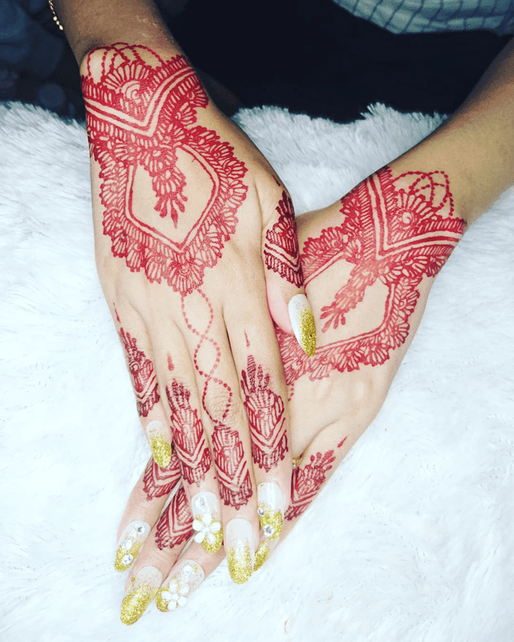 Alluring Teej Henna Design on Back Hand