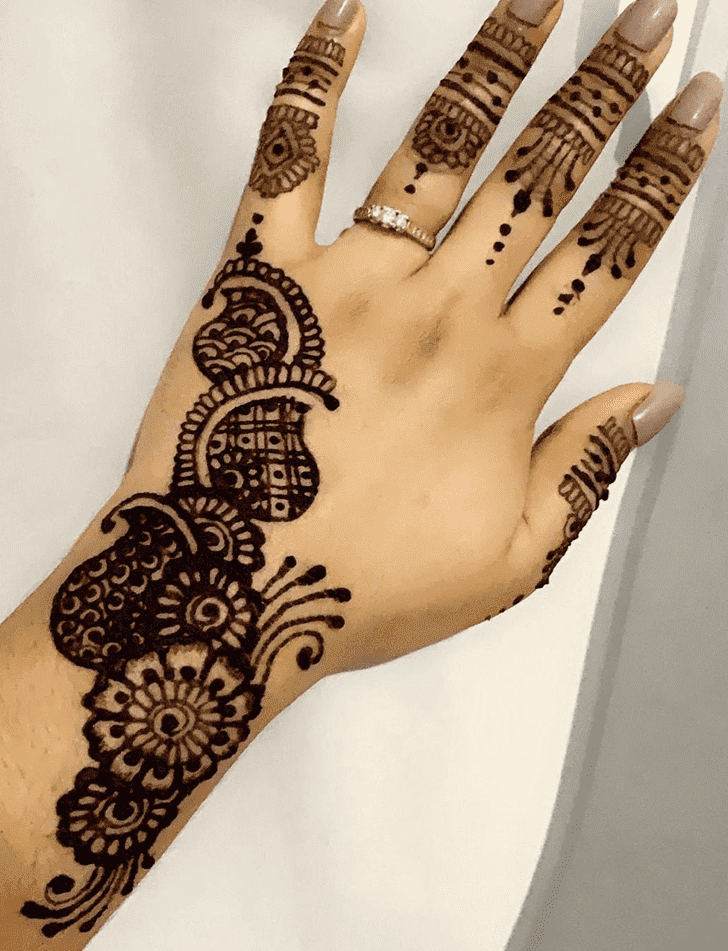 Beauteous Teej Henna Design on Back Hand