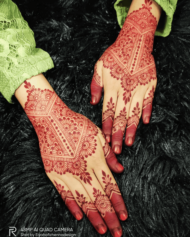 Marvelous Teej Henna Design on Back Hand