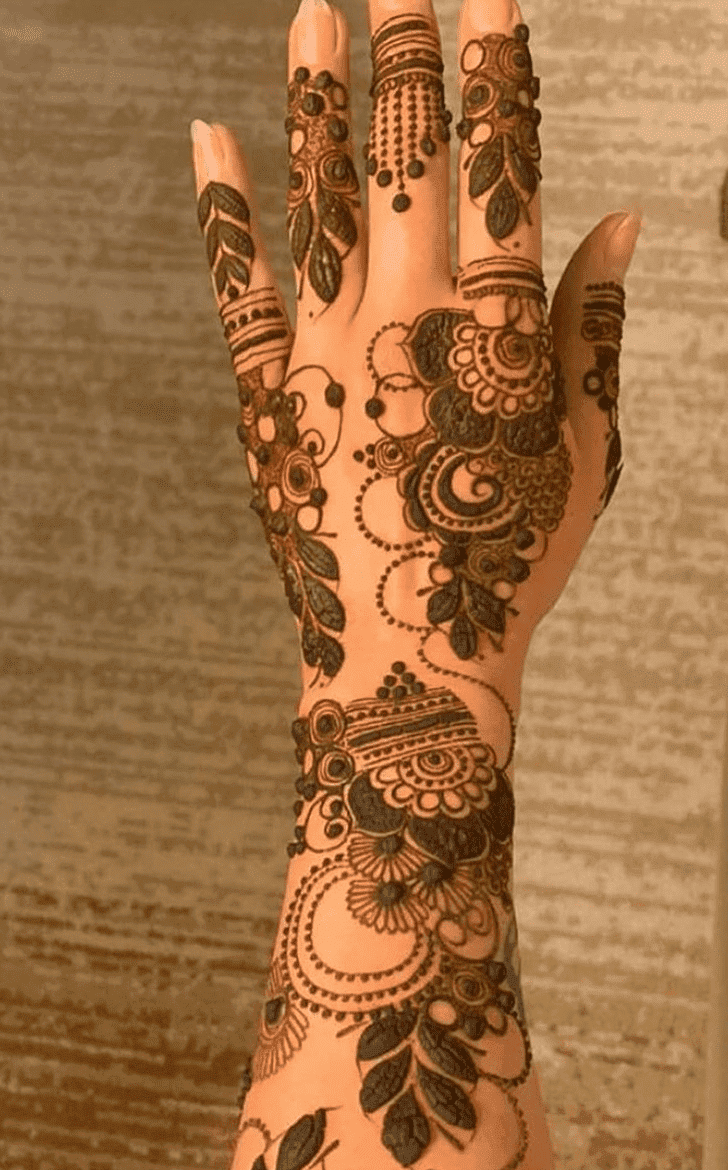 Refined Teej Henna Design on Back Hand