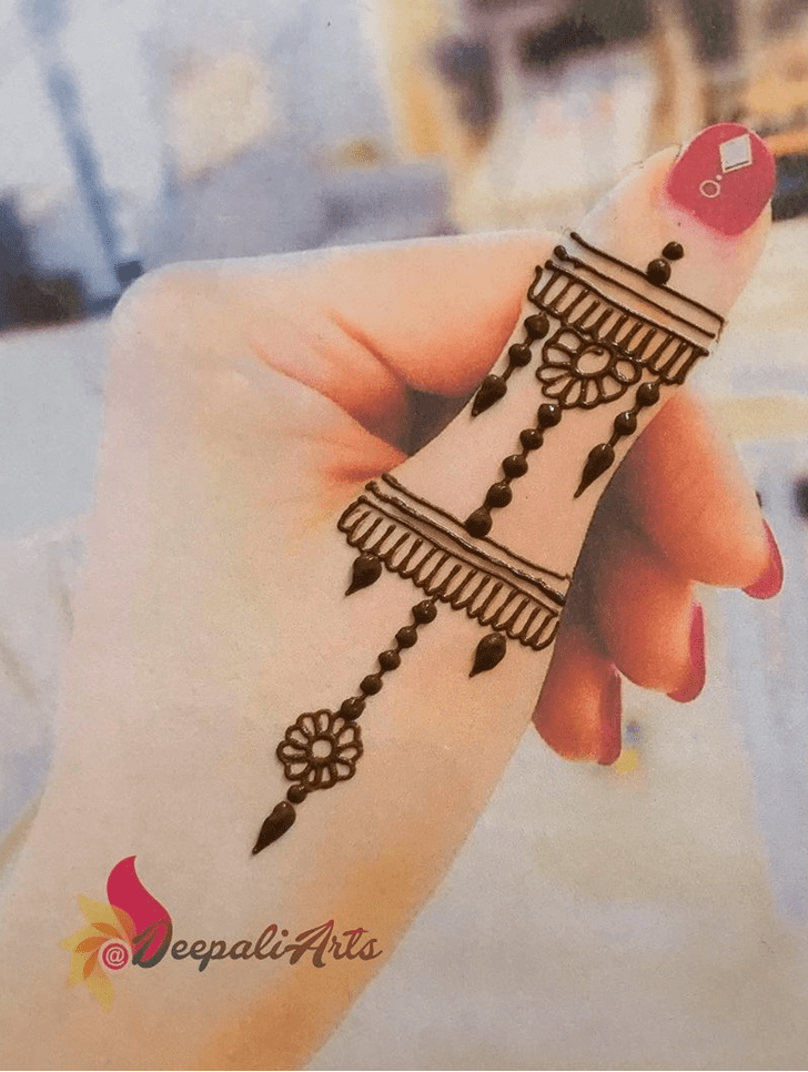 Delicate Thumb Henna Design
