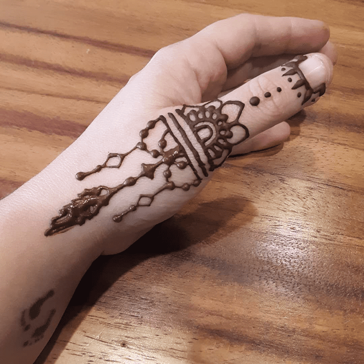 Radiant Thumb Henna Design