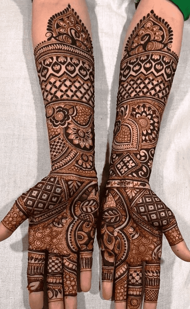 Fascinating Traditional Full Arm Henna Design