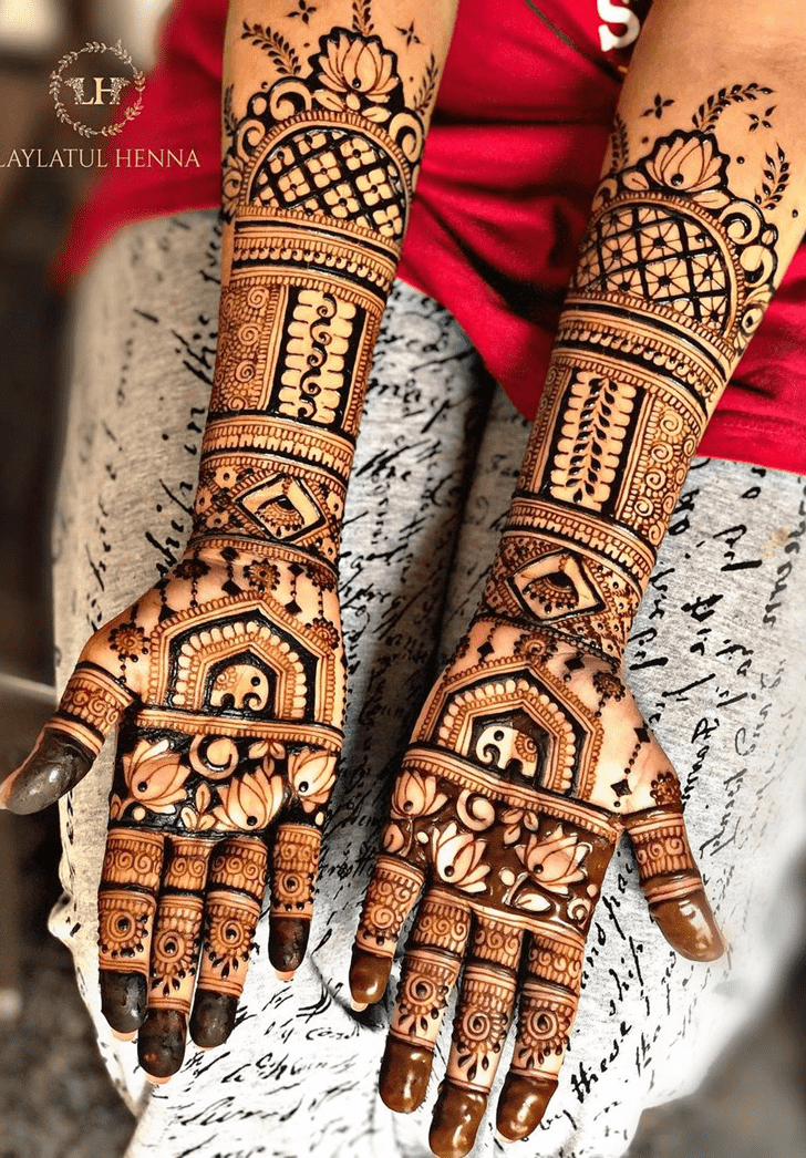Pretty Traditional Full Arm Henna Design